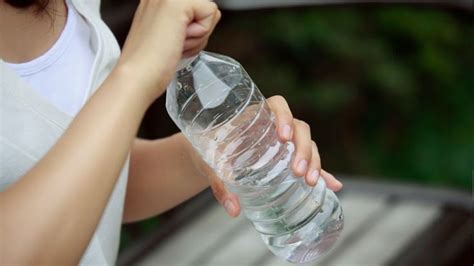 woman tests bottled water|consumer reports on bottled water.